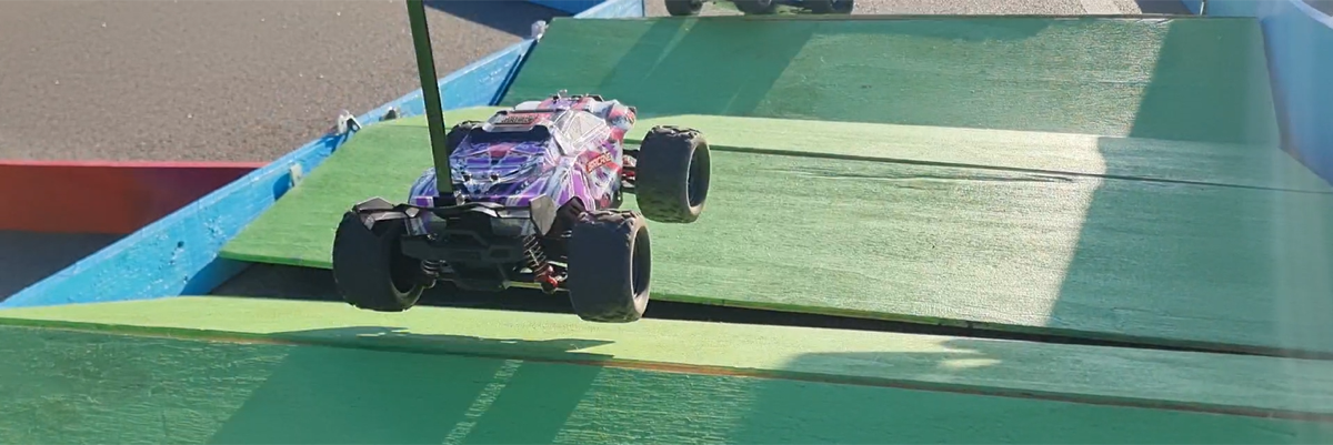 RC car going airborn off the ramp