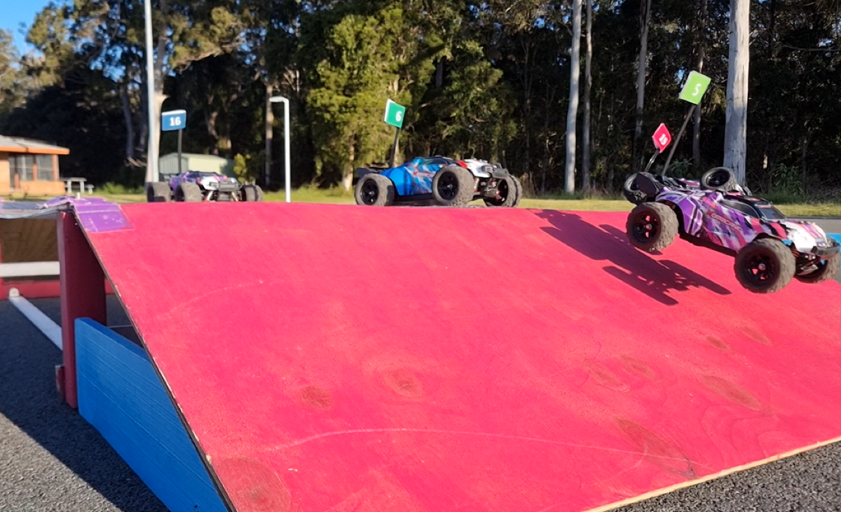RC car jumping over obstacle