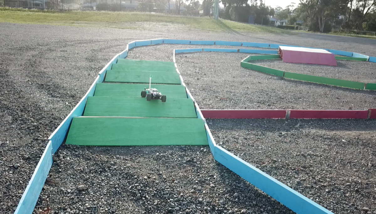 Grand Prix track with cars racing