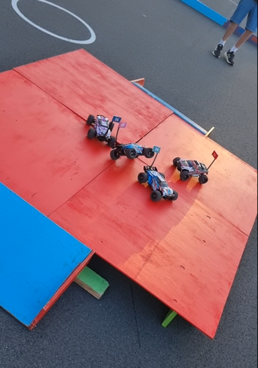 King of the Hill RC car challenge in action